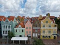 Downtown Willemsted historic city street colourful buildings with pastel-colored colonial architecture