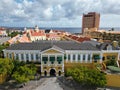 Downtown Willemsted historic city street colourful buildings with pastel-colored colonial architecture