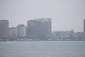 downtown windsor canada city skyline across river in spring winter storm