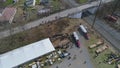 Downward Aerial View of an Amish Mud Sale Horse Auction, Auctioning Buggies, Farm Equipment ty