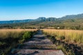 Downward set of concrete steps on a hill leading towards a village Royalty Free Stock Photo