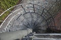 Downward Spiral, Spiral staircase in old town in Warsaw, Poland Royalty Free Stock Photo