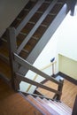Downward view of staircase in old office building Royalty Free Stock Photo