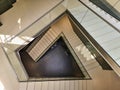 Downward view to triangle spiral staircase