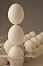 Balancing eggs in a carton