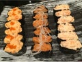 A dozen of 3 kinds Gunkan salmon sushi