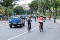 Dozens of cyclists are seen accompanied by a Bahia Military Police car touring the streets of the city of Salvador