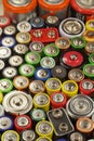 Dozens of types, sizes, colors of used batteries and accumulators. Recycling