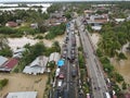 Dozens of vehicles line up on the Lhoksukon bridge during the Aceh flood