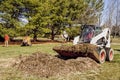 Dozer removing debris from Stump removal Royalty Free Stock Photo