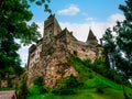 Dracula`s Castle on the hill - the national monument and tourist landmark of Romania in Bran. Bran Castle is a beautiful medieval Royalty Free Stock Photo