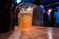 Draft beer.  Enjoying Evening Drinks at the pub party in a nightclub Royalty Free Stock Photo