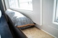 Draft Excluder Under Window Blocking Cold Air Royalty Free Stock Photo