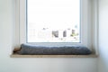 Draft Excluder Under Window Blocking Cold Air Royalty Free Stock Photo