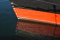 Draft Markings on red and black boat