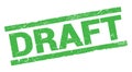 DRAFT text on green rectangle stamp sign