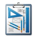 Drafting tools and a clip board with architectural sketches and diagrams Royalty Free Stock Photo