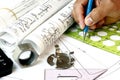 Draftsman with engineering plans Royalty Free Stock Photo