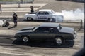 Drag car competitors on the track