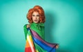 Drag queen celebrating gay pride holding rainbow flag Royalty Free Stock Photo