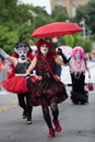 A Drag Queen Runs the streets in the Gay Pride Parade