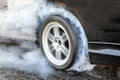 Drag racing car burn tire for the race. Royalty Free Stock Photo