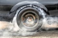 Drag racing car burn tire for the race. Royalty Free Stock Photo