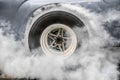 Drag racing car burn tire for the race. Royalty Free Stock Photo