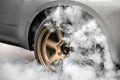 Drag racing car burn tire for the race. Royalty Free Stock Photo