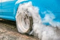 Drag racing car burn tire in preparation for the race Royalty Free Stock Photo