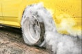 Drag racing car burn tire in preparation for the race Royalty Free Stock Photo