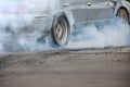 Drag racing car burns tires prepare for the race Royalty Free Stock Photo