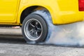 Drag racing car burn tire for the race. Royalty Free Stock Photo