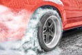 Drag racing car burn tire for the race. Royalty Free Stock Photo