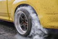 Drag racing car burns tires for the race Royalty Free Stock Photo