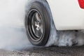 Drag racing car burns tires for the race Royalty Free Stock Photo