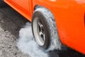 Drag racing car burns tires for the race Royalty Free Stock Photo