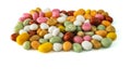 Dragees candy multicolored sea pebbles on a white background