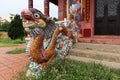 Dragon on the access stairs of the Van Mieu Confucius Temple. Hoi An, Vietnam