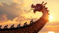 A dragon boat adorned with intricate patterns against the backdrop of a setting sun. Royalty Free Stock Photo