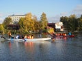 Dragon boat racing. Dragon boat participant practice paddling during sunset golden hour. Russia, Saratov - September 2019 Royalty Free Stock Photo