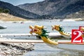 Dragon boats moored at wooden pier or jetty on the lake Royalty Free Stock Photo