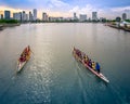 Dragon Boats practicing in Kallang Basin, near Singapore Sports Hub. It is a sports and recreation district in Kallang, Singapore.