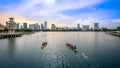 Dragon Boats practicing in Kallang Basin, near Singapore Sports Hub. It is a sports and recreation district in Kallang, Singapore.