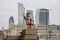 Dragon boundary mark and City of London skyline