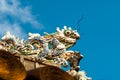 Dragon decor on pavilion in garden of Citadel in Hue. Vietnam.