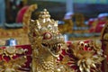 Dragon figure in a Balinese temple in red and gold colours