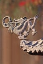 Dragon figure on a roof of a Taoist temple, Beijing, China