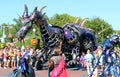 A dragon float in a parade at Disneyworld