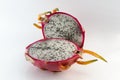 Dragon fruit cut in half on a white background closeup Royalty Free Stock Photo